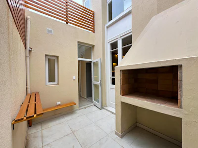 Casa de 3 dormitorios reciclada con patio y parrillero en Lourdes - Imagen 2