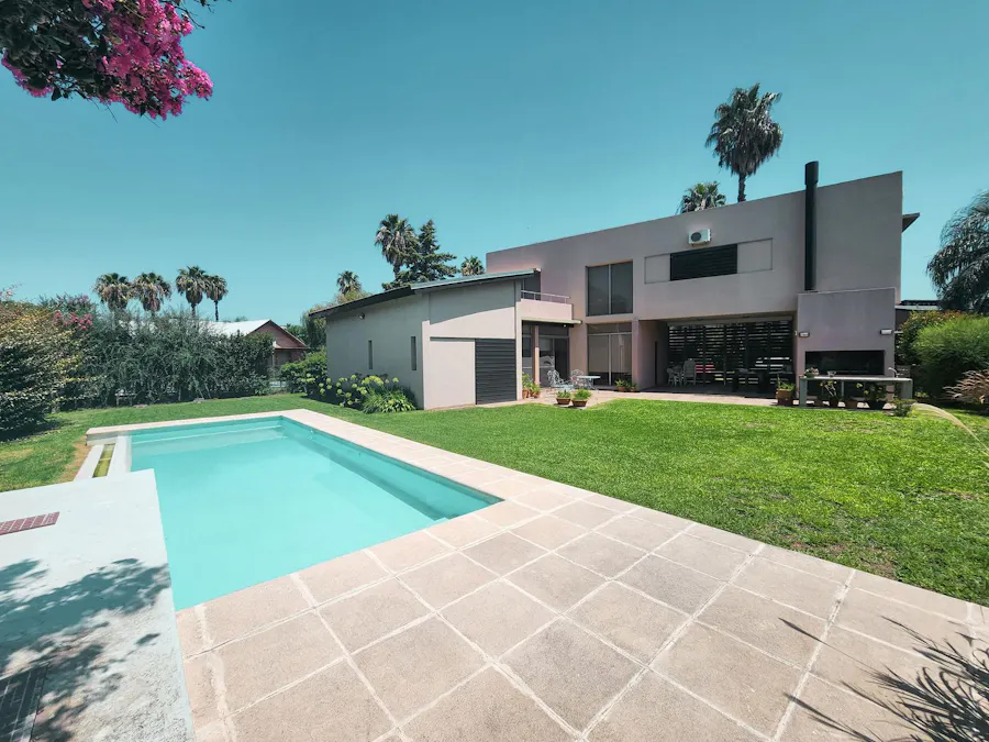 Casa de 3-4 dormitorios con pileta en San Marino - Funes Hills - Imagen 1 de 45