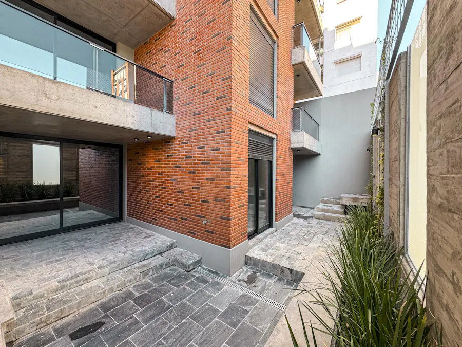 Departamento de 3 dormitorios a estrenar con patios y amenities - Imagen 1 de 29