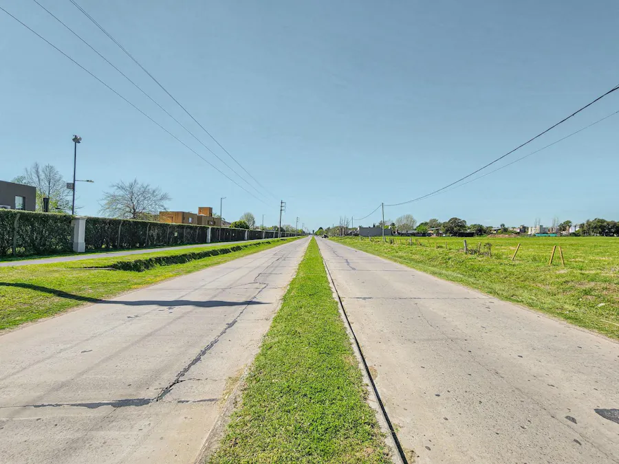 Terreno de 692m² en barrio abierto residencial planificado frente a Funes Hills - Imagen 1 de 4