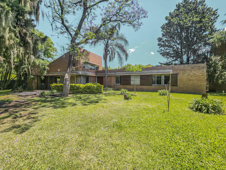 Casa quinta de 3 dormitorios con amplio jardín en Funes - Imagen 1 de 19