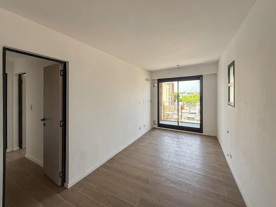 Departamento de 2 dormitorios con radiadores y quincho común en Abasto - Imagen 1 de 16