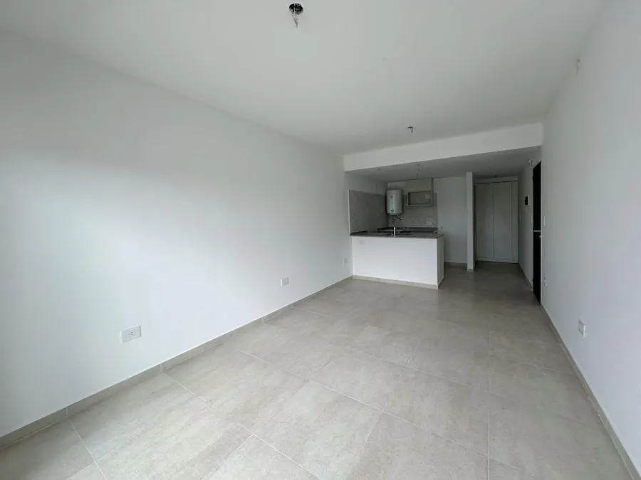 Departamento monoambiente con patio a estrenar en Lourdes - Imagen 1 de 9