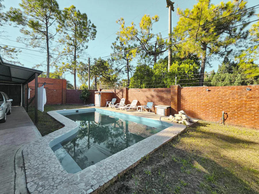 Casa de 1 dormitorio con quincho, pileta y jardín en Barrio Tango - Imagen 1 de 24