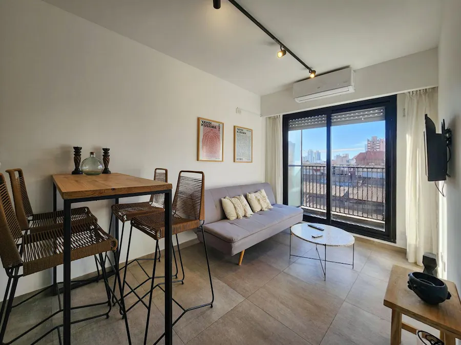 Departamento de 1 dormitorio amoblado con terraza y parrillero en Alquiler - Imagen 1 de 11